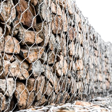 Gabion close-up, wall of stones and wire